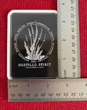 Load image into Gallery viewer, The Ocotillo Spirit Sticker is measured here by two (2) rulers. The size is 2.55&quot; wide by 3.5&quot; high.
