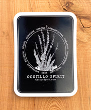 Load image into Gallery viewer, Ocotillo Spirit Sticker 2.55&quot; wide by 3.5&quot; in height displayed on wood for contrast. Design is white on a black background with rounded corners.  Each vinyl sticker has an easy peel backing with a standard gloss finish.
