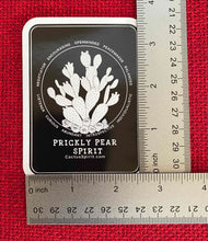 Load image into Gallery viewer, The Prickly Pear Spirit Sticker is measured here by two (2) rulers. The size is 2.55&quot; wide by 3.5&quot; high.
