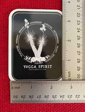 Load image into Gallery viewer, The Yucca Spirit Sticker is measured here by two (2) rulers. The size is 2.55&quot; wide by 3.5&quot; high.
